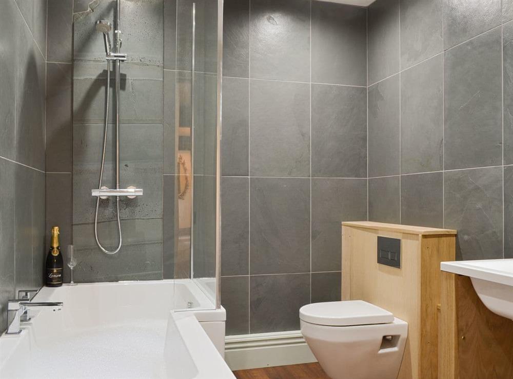 Family bathroom with shower over bath at Souterstead in Torver, near Coniston, Cumbria