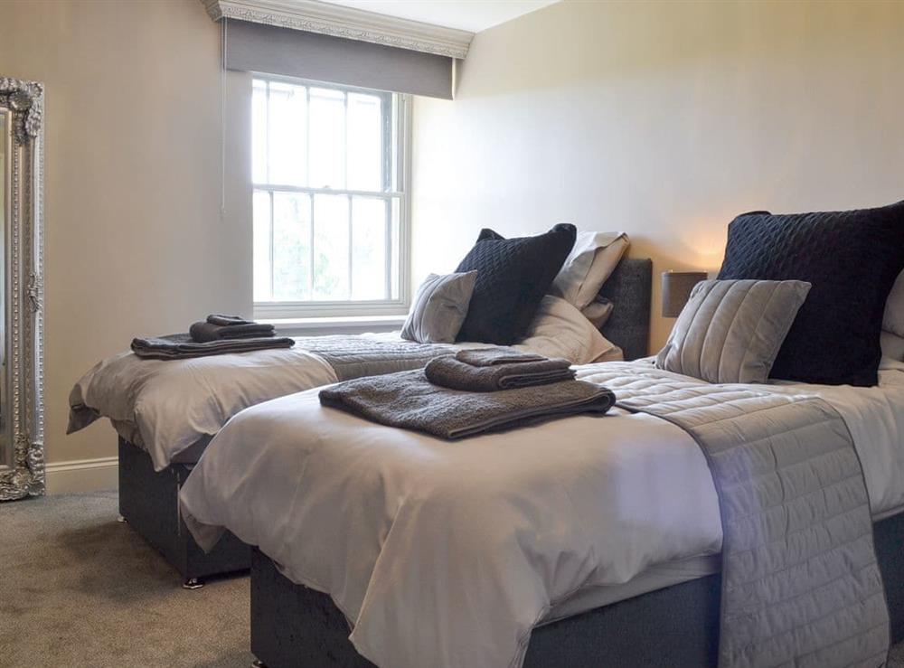 Versatile bedroom with zip-link beds at Souterstead in Torver, near Coniston, Cumbria