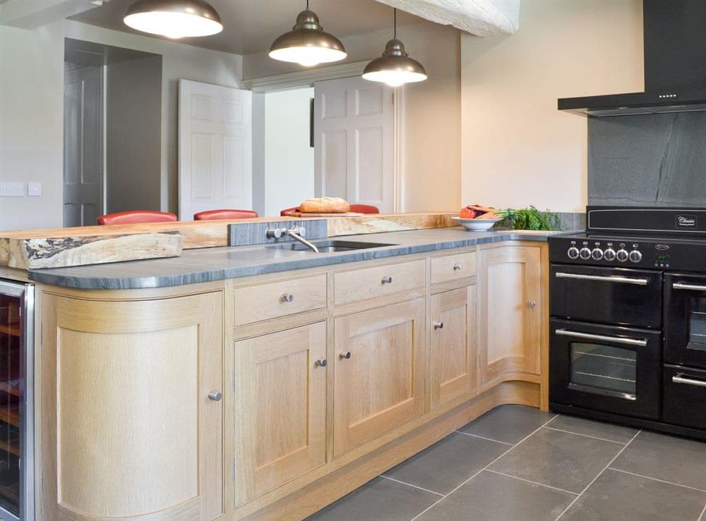 Well-appointed kitchen/diner with breakfast bar at Souterstead in Torver, near Coniston, Cumbria