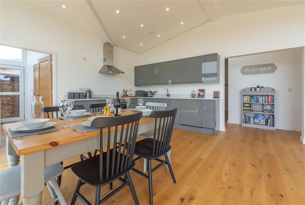 Modern open plan kitchen with dining for 6 at South Barn, Ingham