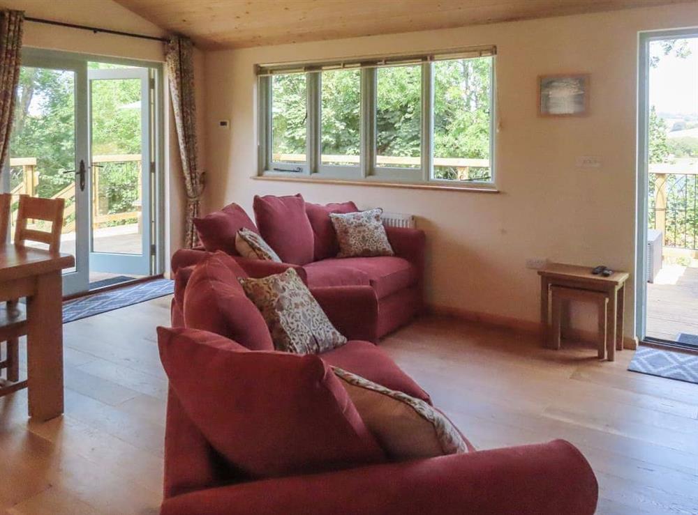 Open plan living space at South Greenslade Farm Lodge in Brompton Regis, Exmoor, Somerset