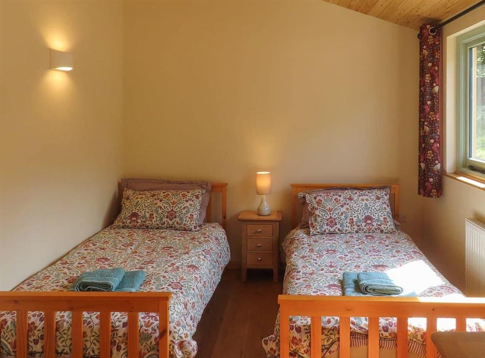 Twin bedroom at South Greenslade Farm Lodge in Brompton Regis, Exmoor, Somerset