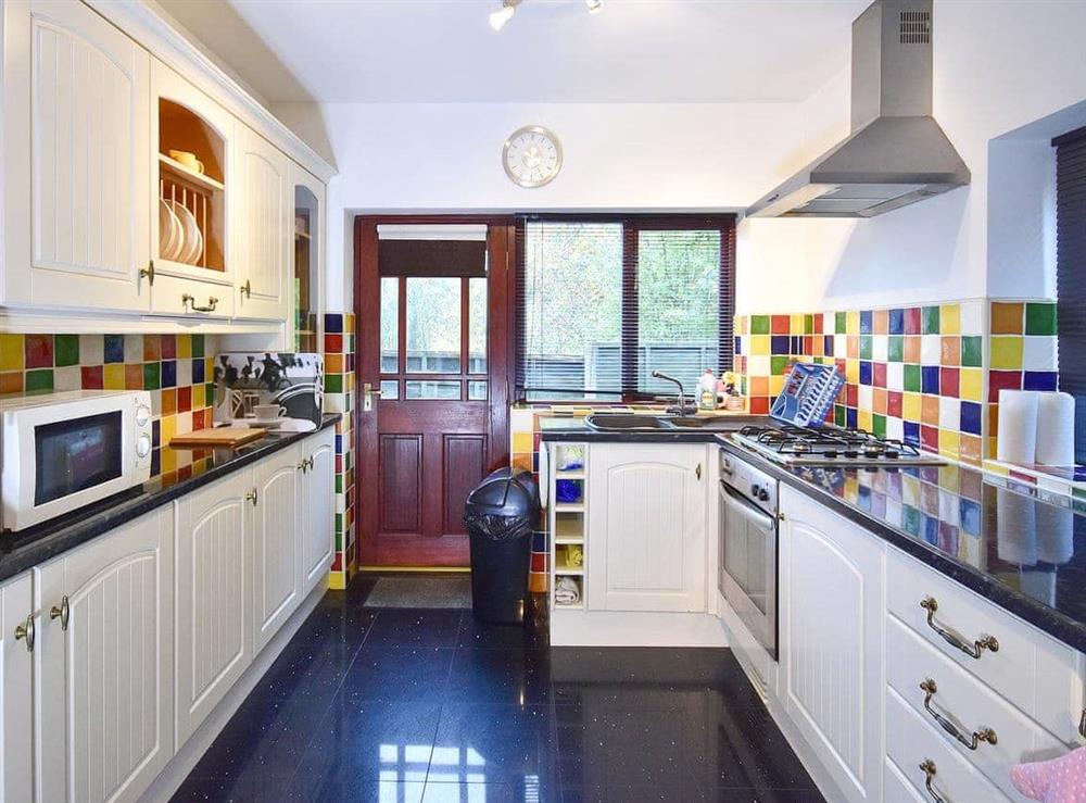 Well appointed kitchen with garden access at South Lodge Cottage in Worthington, near Standish, Lancashire
