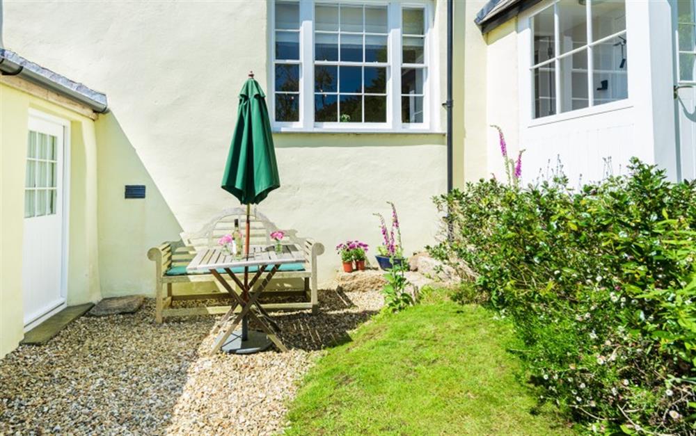 Relax in the peaceful garden  at South Manor Cottage, Gerston in Kingsbridge