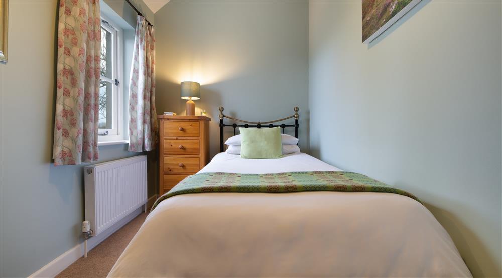 The single bedroom at South Pilton Green Farmhouse in Abertawe, West Glamorgan