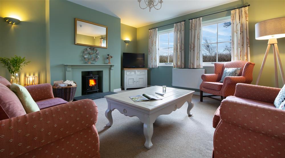 The sitting room at South Pilton Green Farmhouse in Abertawe, West Glamorgan