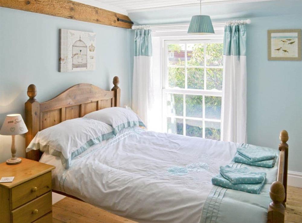 Double bedroom at South View Cottage in West Beckham, Norfolk