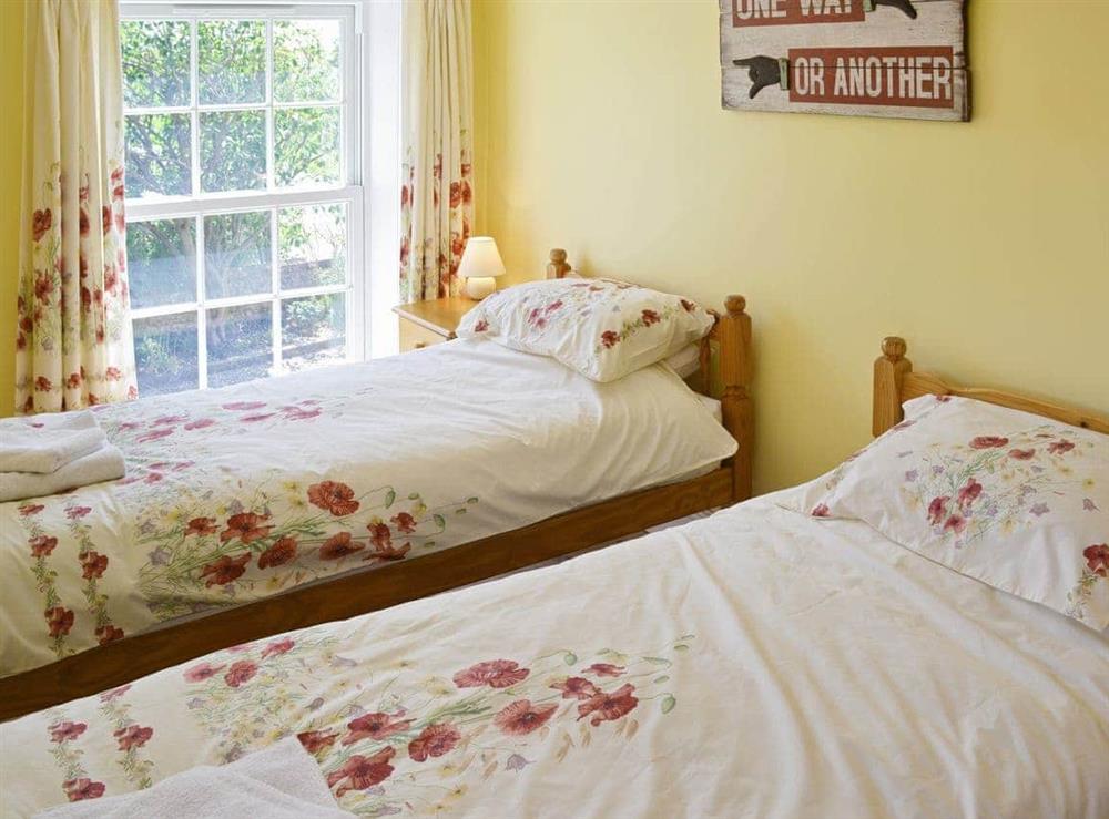 Twin bedroom at South View Cottage in West Beckham, Norfolk