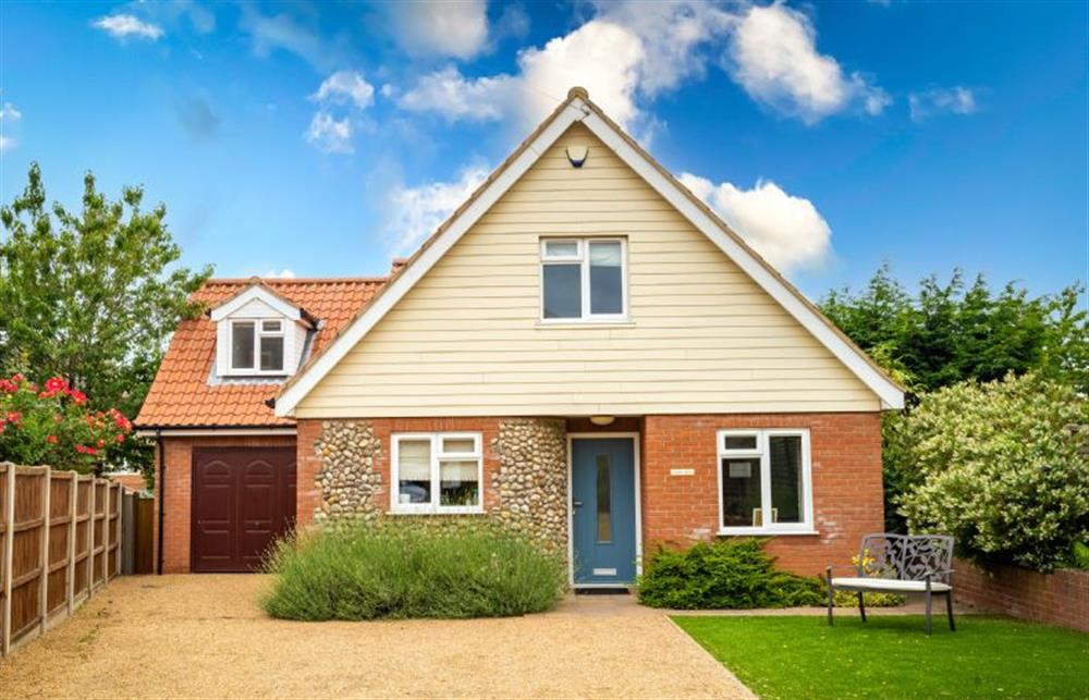 A lovely brick and flint chalet-style cottage set in the heart of the seaside village of West Runton