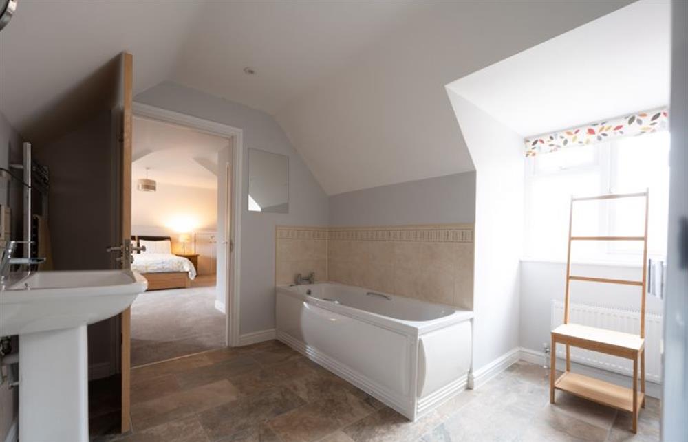 En-Suite with bath, separate shower, wash basin and WC at South View, West Runton near Cromer