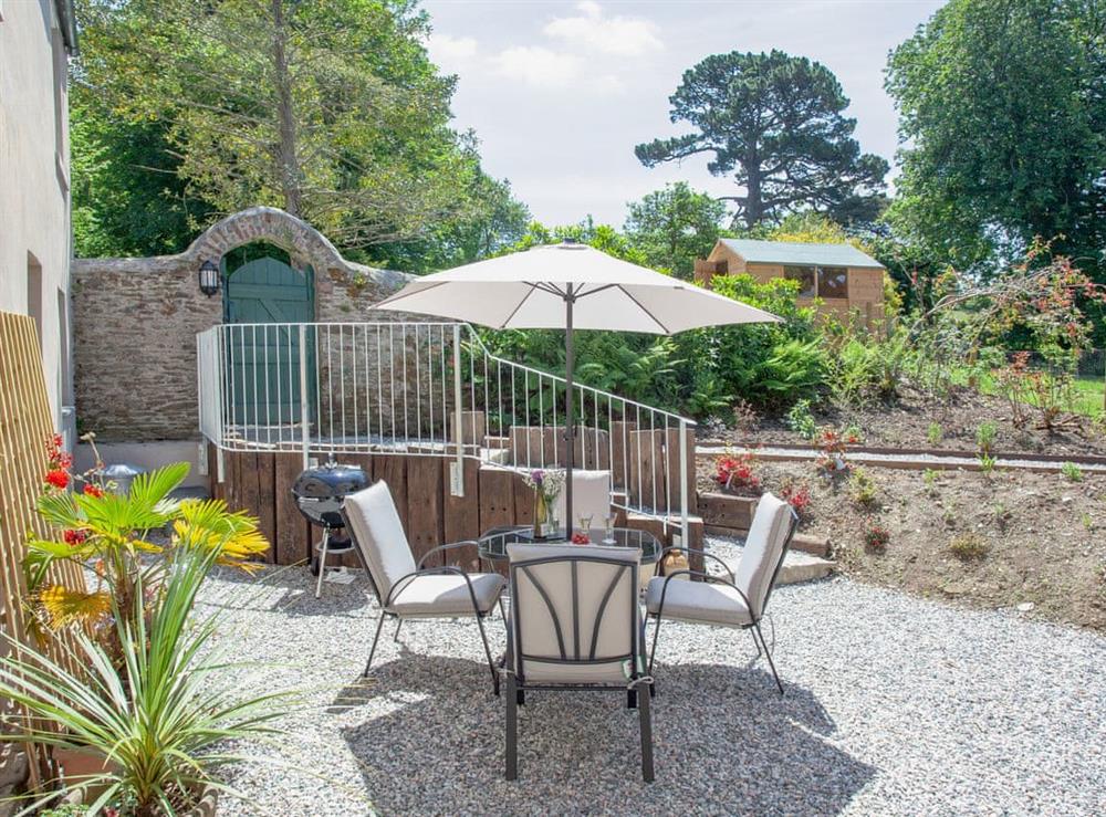 Patio (photo 2) at South Wing Cottage in Rumleigh, Devon
