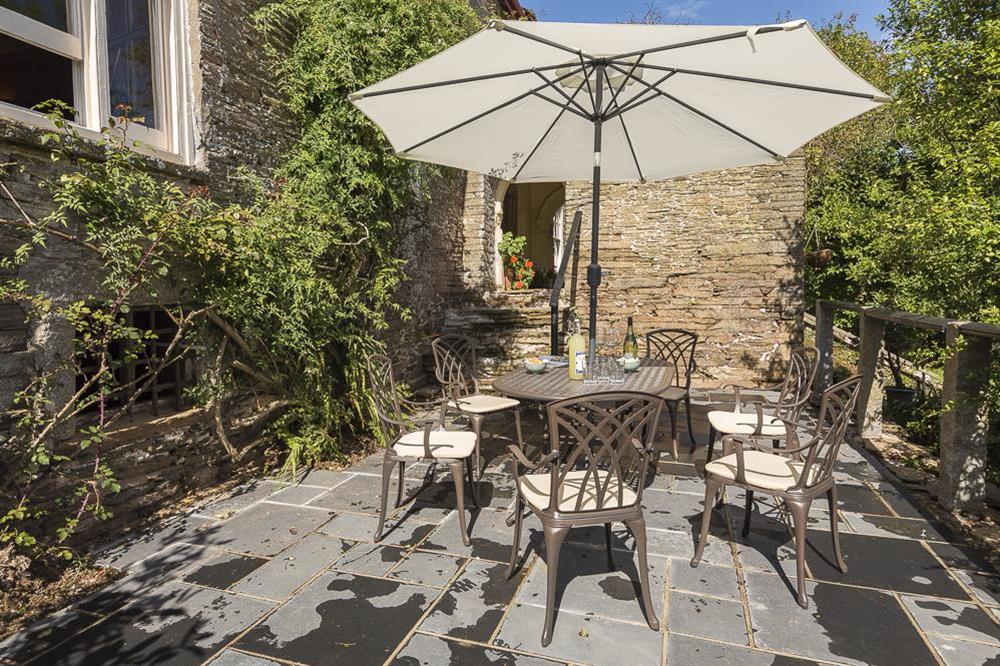 Open terrace with garden table and chairs at South Wing in , Nr Kingsbridge