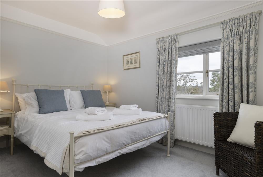 First floor: Bedroom two with a 5ft king-size bed at Southcroft Cottage, Bredons Norton