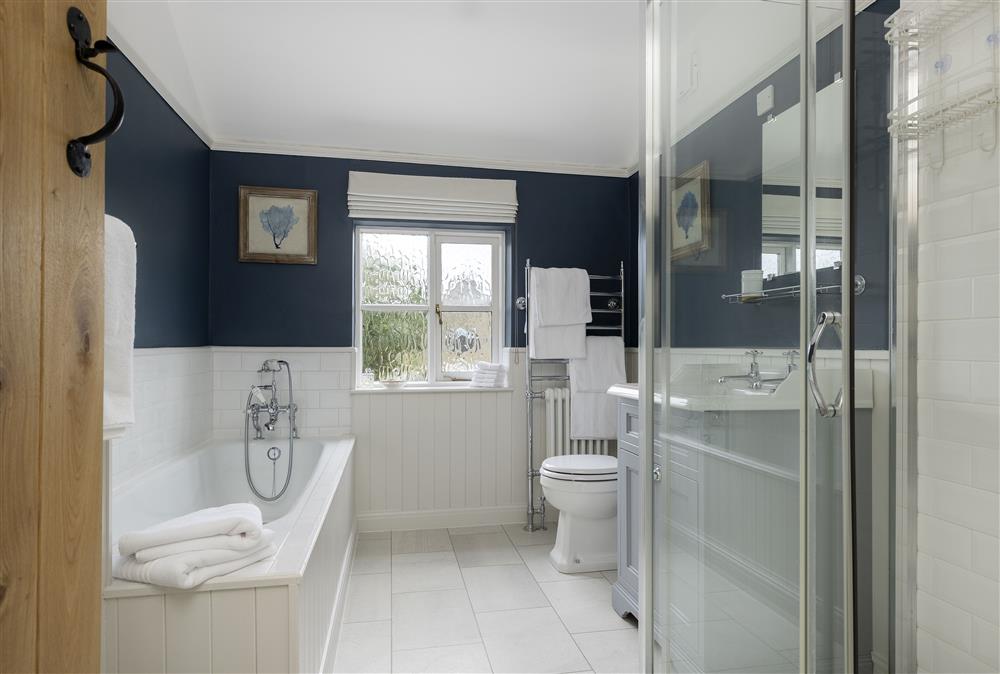 First floor: Family bathroom with bath and separate, large walk-in shower at Southcroft Cottage, Bredons Norton