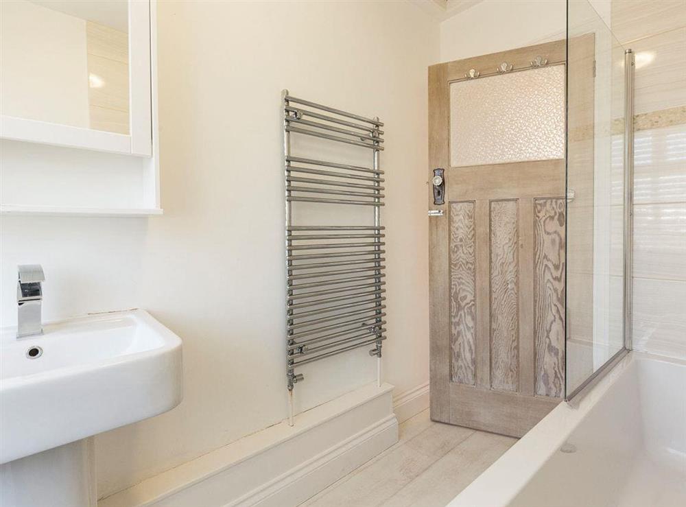 Family bathroom with shower over bath at Southern Bell in Hayling Island, Hampshire