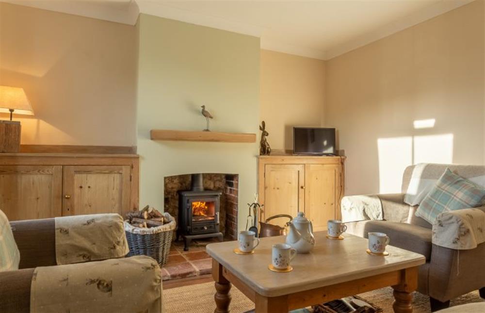 Ground floor: The sitting room has a cosy wood burning stove at Southvale, Snettisham near Kings Lynn