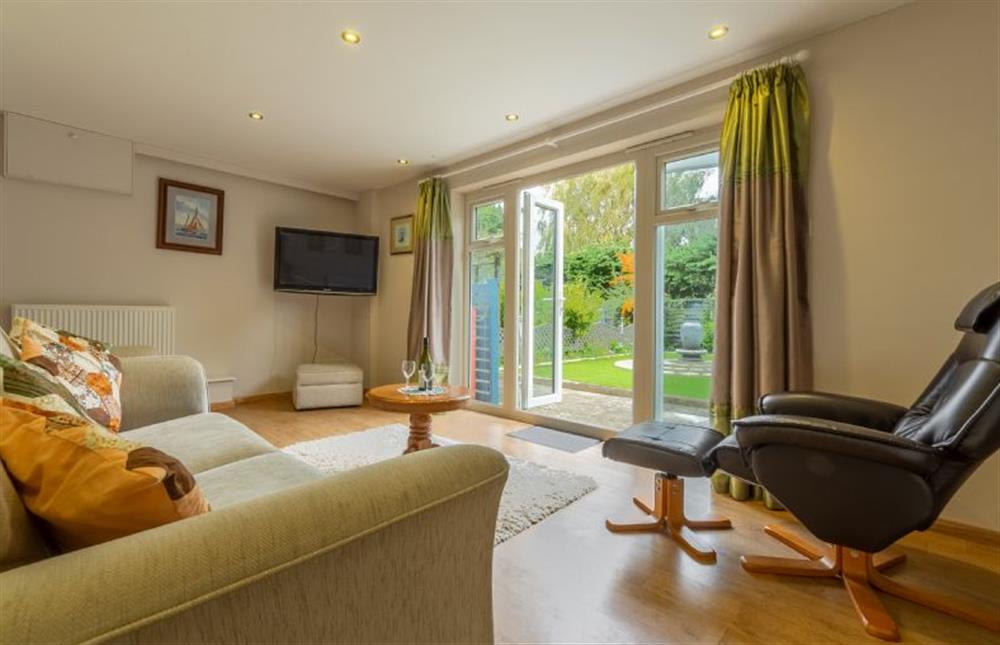Southview Annexe: Light and airy, open-plan sitting room with french doors to the garden at Southview Annexe, Sculthorpe near Fakenham