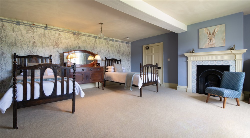 The first-floor twin bedroom at Southwood House Farm in Ticknall, Leicestershire
