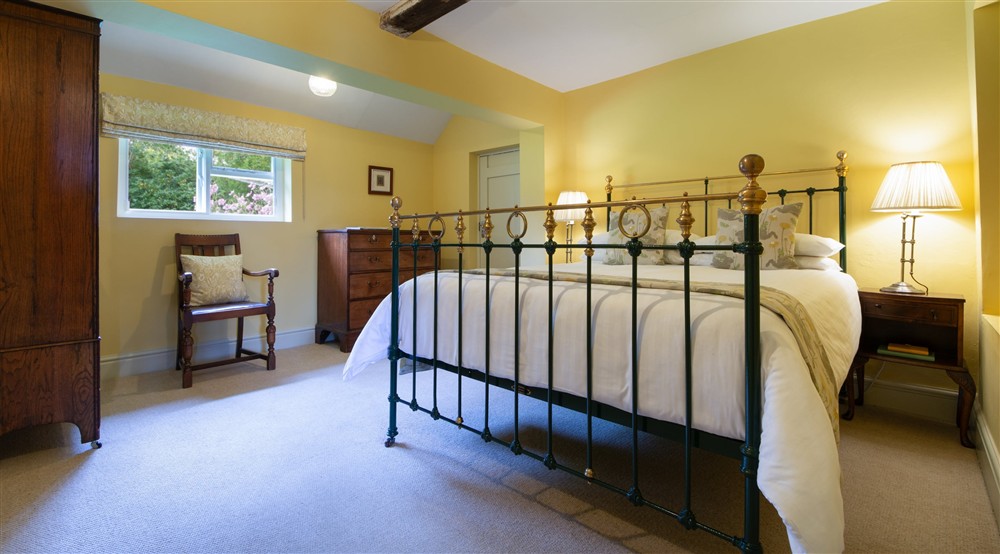 The ground-floor double bedroom at Southwood House Farm in Ticknall, Leicestershire