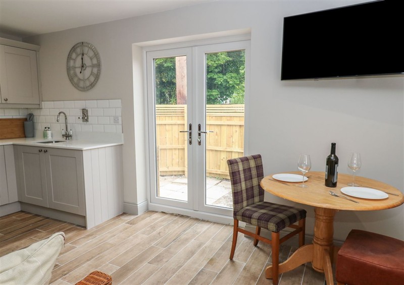 Relax in the living area at Spacious Cottage Number 10, Brandon