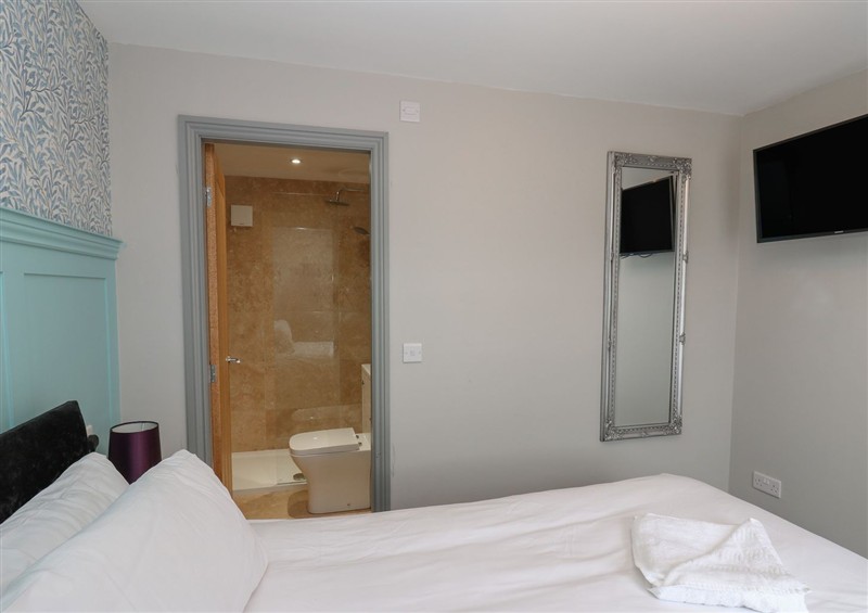 This is the bedroom (photo 2) at Spacious Cottage Number 9, Brandon