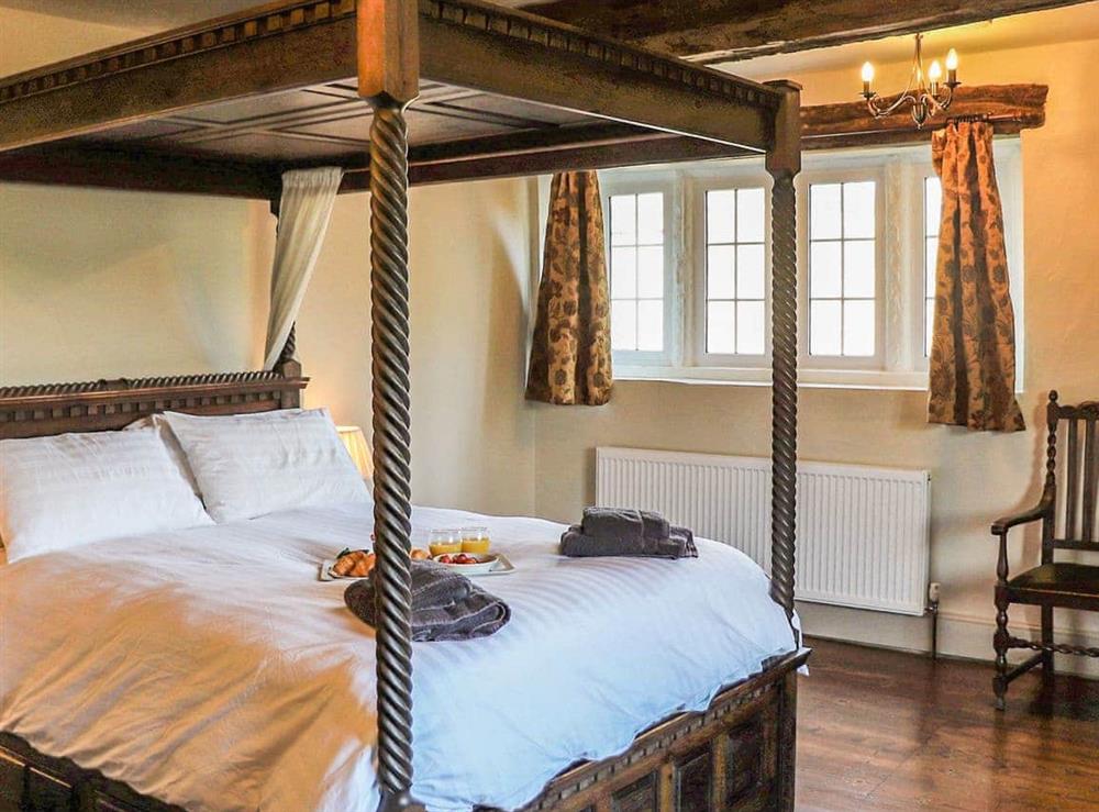Four Poster bedroom at Span Farm House in Wroxall, near Ventnor, Isle of Wight