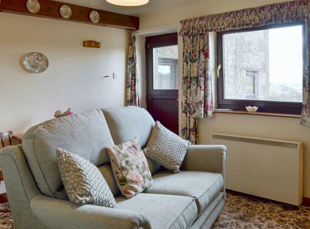 Cosy living/ dining room at Speedwell Corner in Earl Sterndale, near Buxton, Derbyshire