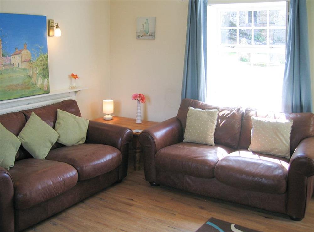 Bright and airy living room at Speedwell Cottage in Trunch, near North Walsham, Norfolk