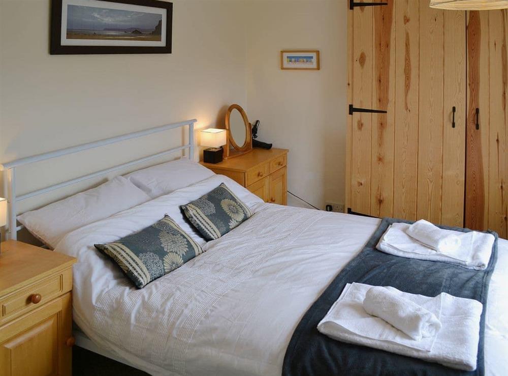 The cosy and romantic double bedroom at Speedwell Cottage in Trunch, near North Walsham, Norfolk