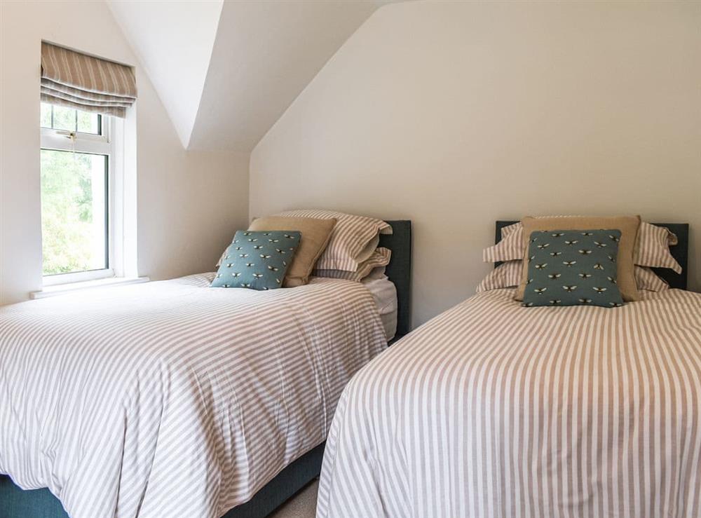 Twin bedroom at Speedwell Cottage in Woodgreen, Fordingbridge, Hampshire