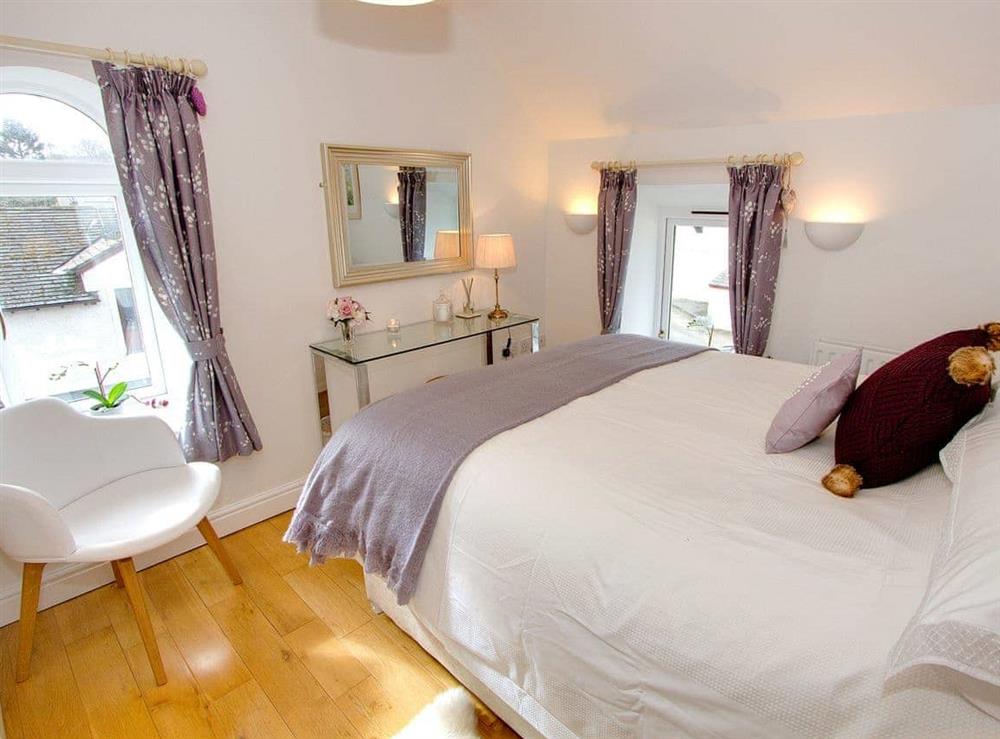 Comfy bedroom with kingsize bed (photo 2) at Spice Mill Cottage in Kirkby Lonsdale, Cumbria