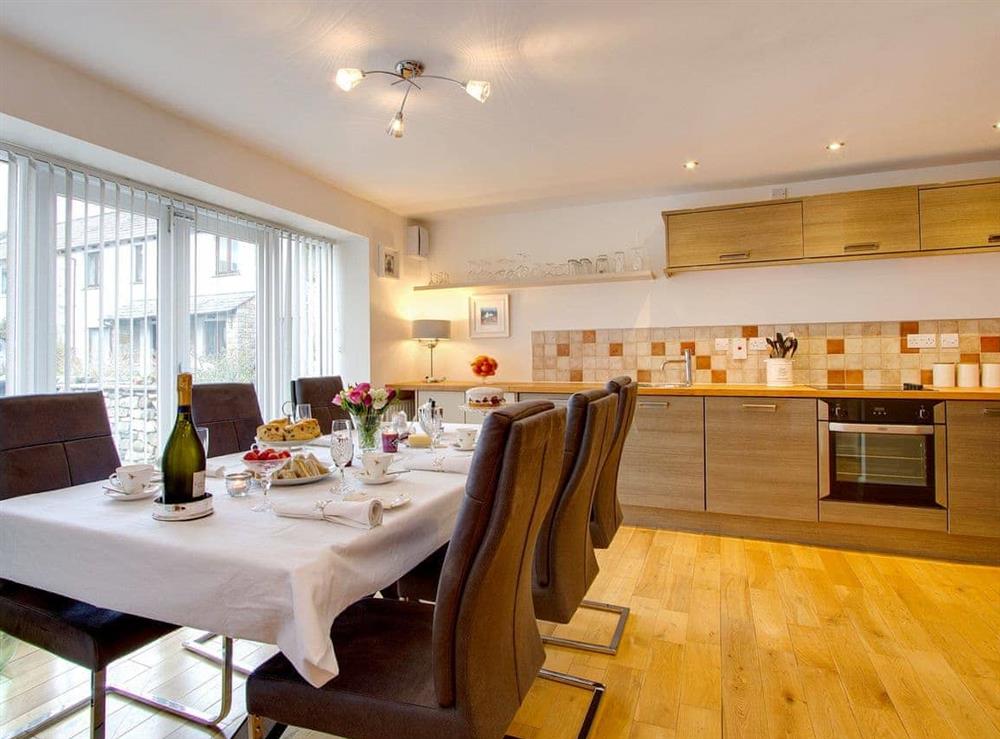 Modern fitted kitchen and dining area at Spice Mill Cottage in Kirkby Lonsdale, Cumbria