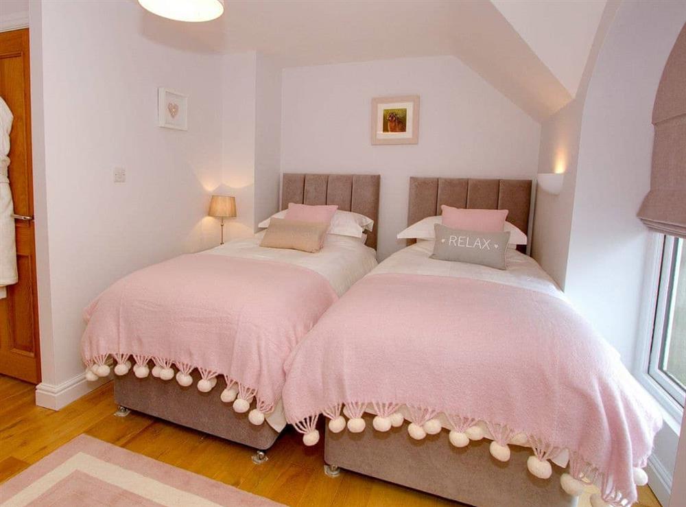Relaxing twin bedroom at Spice Mill Cottage in Kirkby Lonsdale, Cumbria