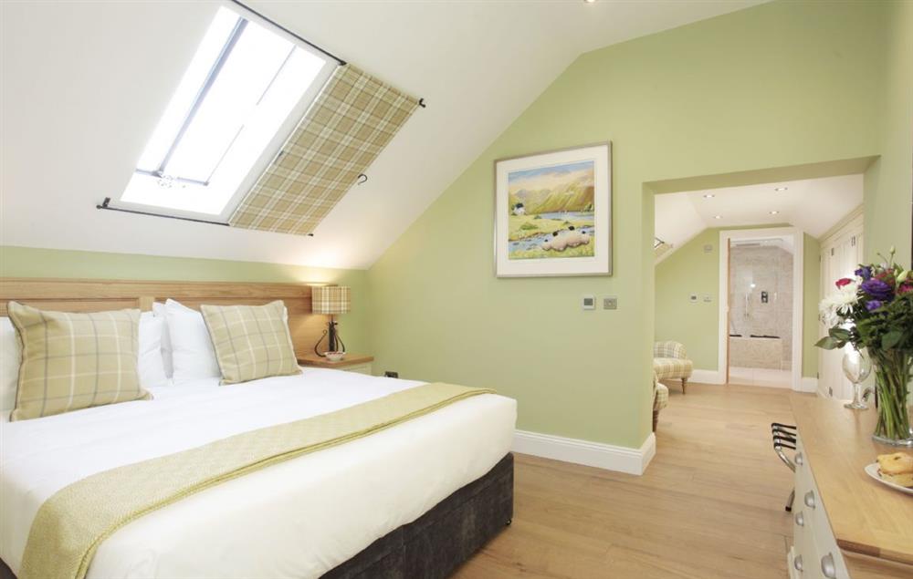First floor: Double bedroom with zip and link bed and walk through wardrobe are at Spicer Manor, Ingbirchworth
