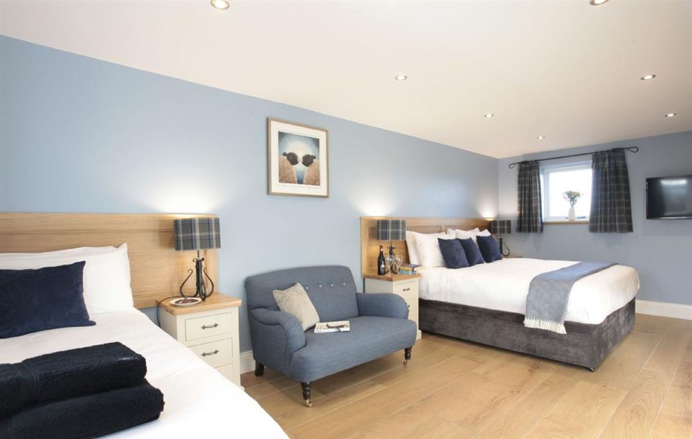 First floor: Double bedroom with zip and link bed, one single bed and views at Spicer Manor, Ingbirchworth