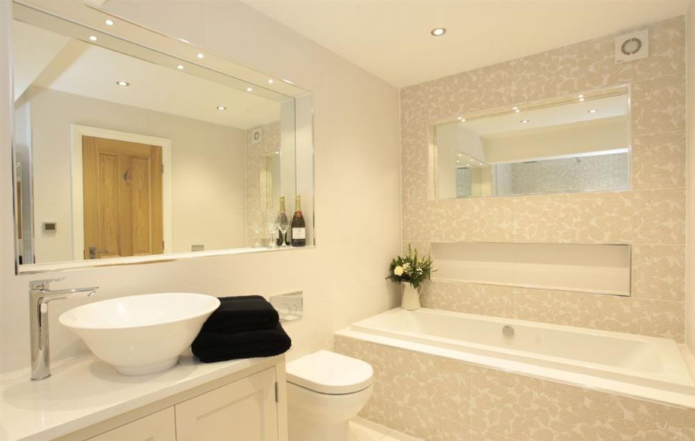 First floor: Ensuite with walk in shower and separate bath at Spicer Manor, Ingbirchworth