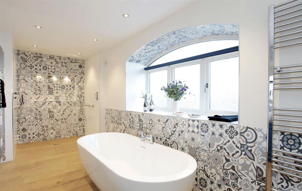 Ground floor: Double walk in shower with two shower heads, two sinks and a separate bath at Spicer Manor, Ingbirchworth