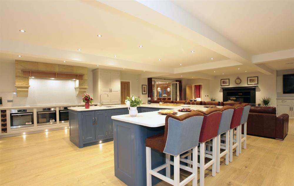 Ground floor: Large island with stools on two sides to seat 11 guests  at Spicer Manor, Ingbirchworth