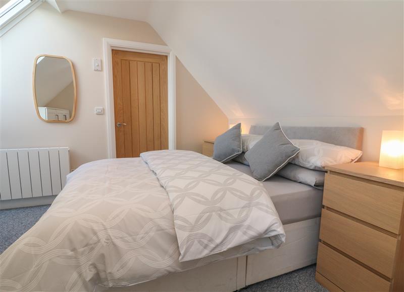 One of the bedrooms at Spicery Barn Loft, Tedburn St Mary