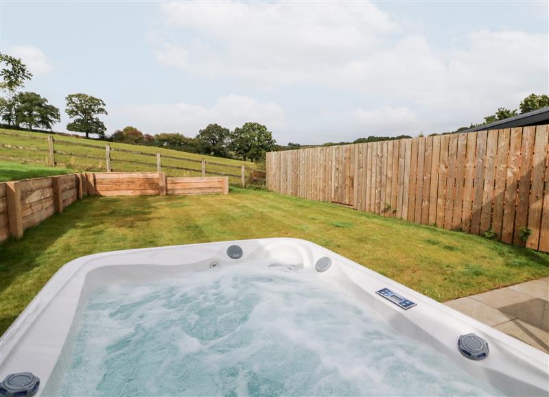 There is a swimming pool at Spicery Barn Loft, Tedburn St Mary