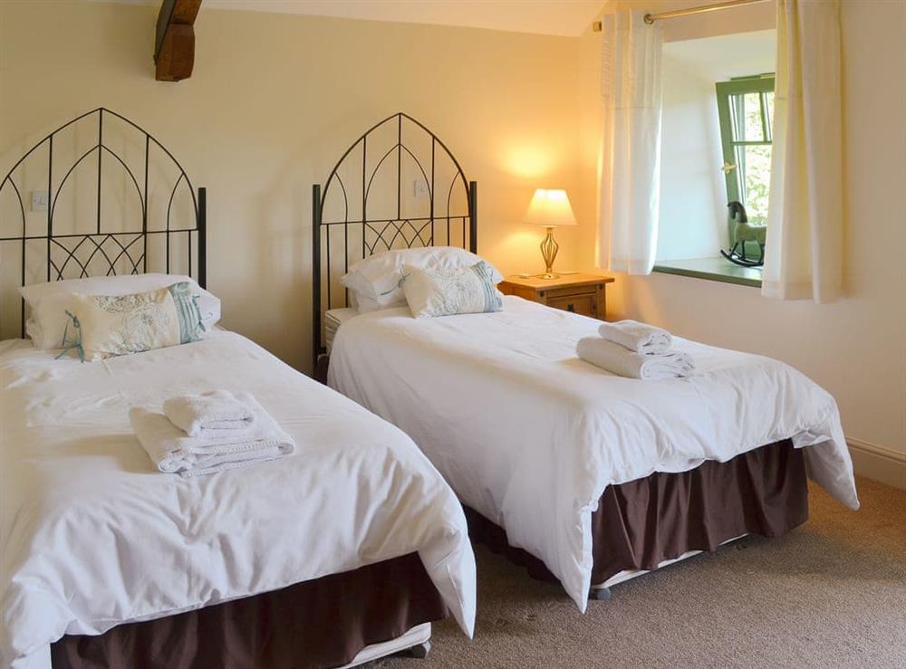 Well presented twin bedroom at Spindlestone Mill Apartments -The Loft in Belford, near Bamburgh, Northumberland
