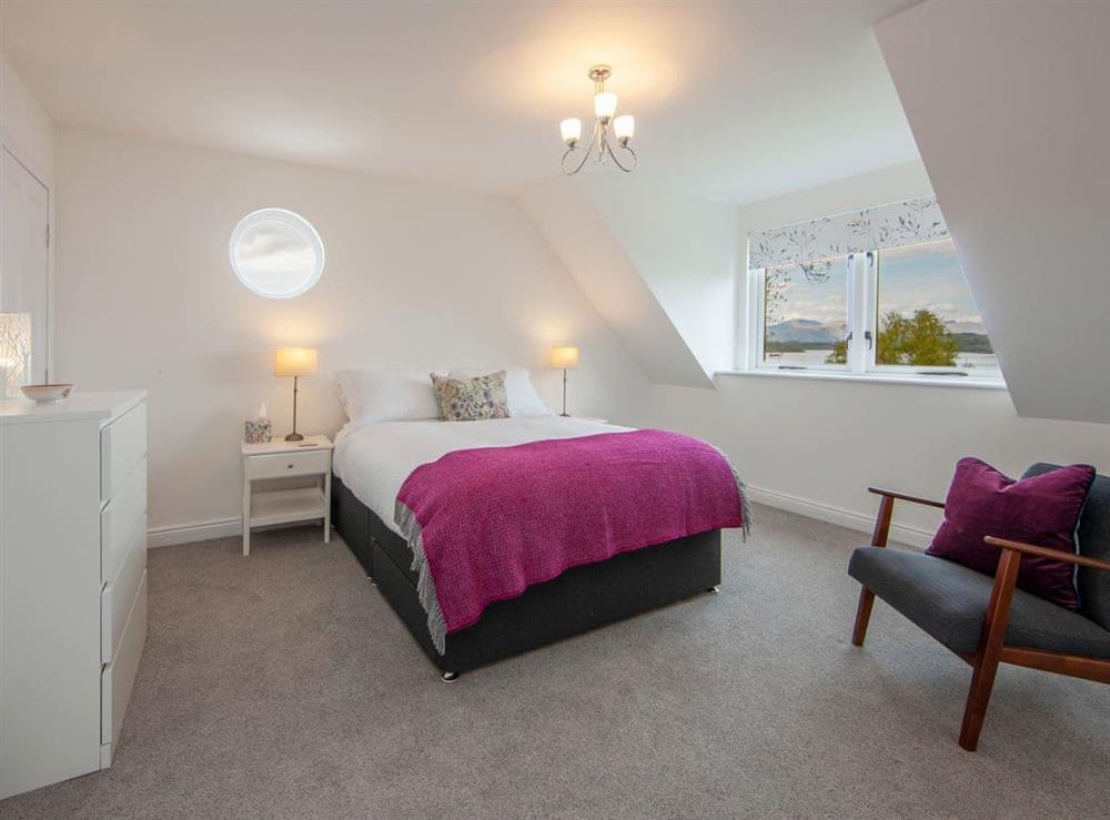 Master bedroom with en-suite at Spindrift in Benderloch, Argyll