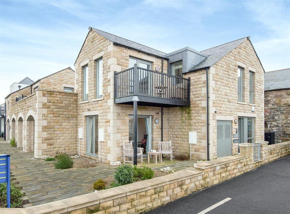 Newly-built stone holiday cottage with views out to sea at Spindrift in Seahouses, Northumberland