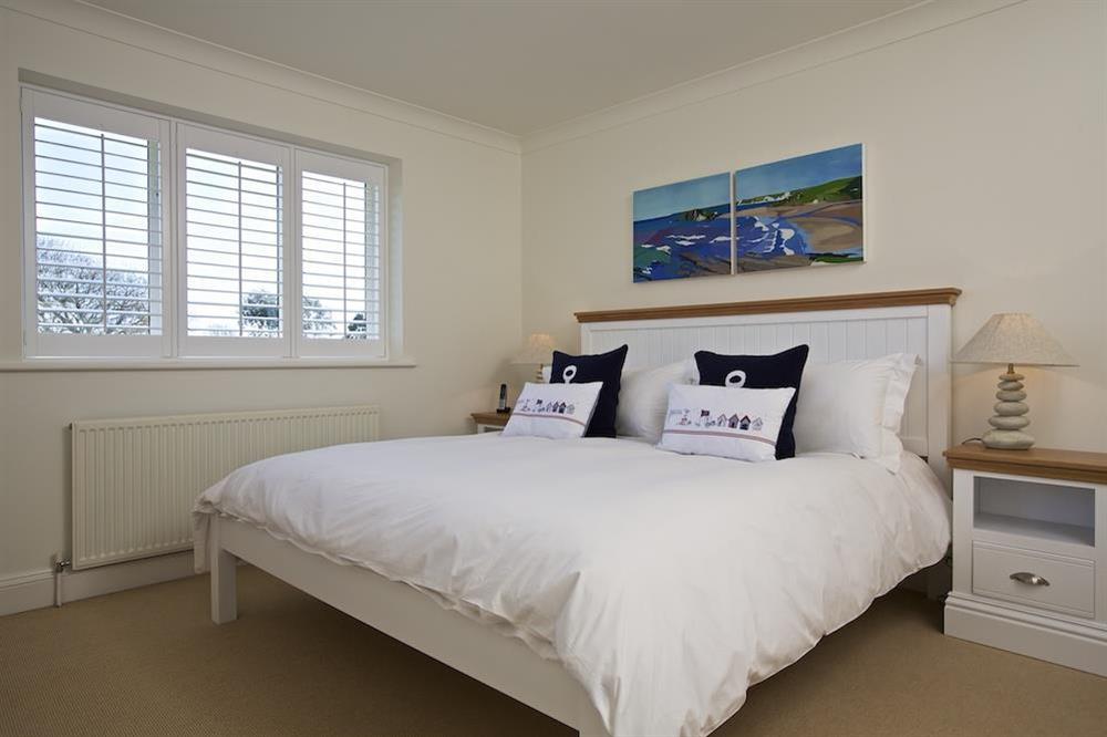 Double bedroom with King's size bed and beautiful countryside views at Spindrift in , Thurlestone