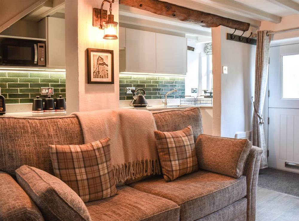 Open plan living space at Spinners Cottage in Carnforth, Cumbria