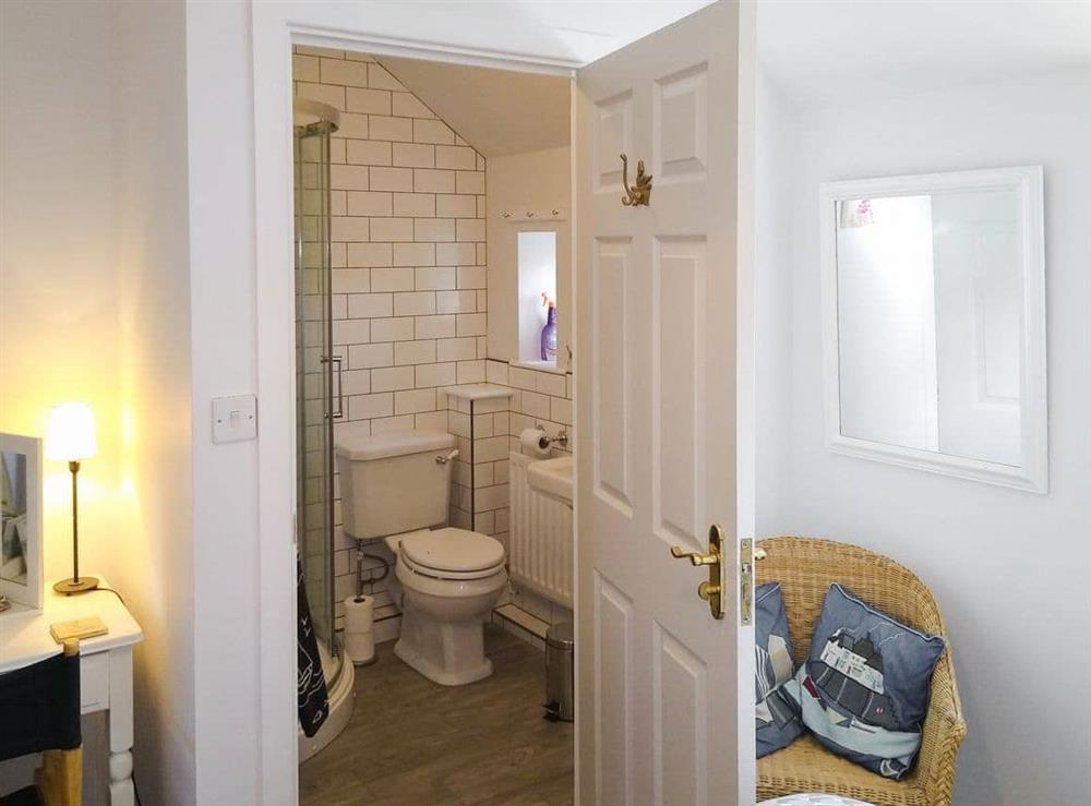 Double bedroom with en-suite shower room at Spinney in Seahouses, Northumberland
