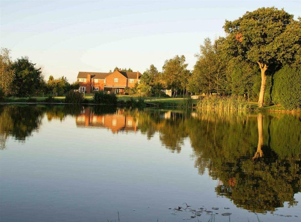 Lake within the grounds at Sporting Heights in Clows Top, near Kidderminster, Worcestershire