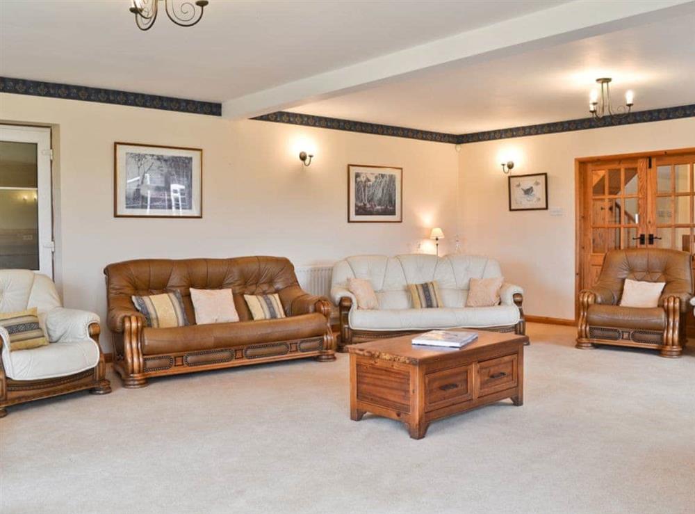 Large spacious living room (photo 2) at Sporting Heights in Clows Top, near Kidderminster, Worcestershire