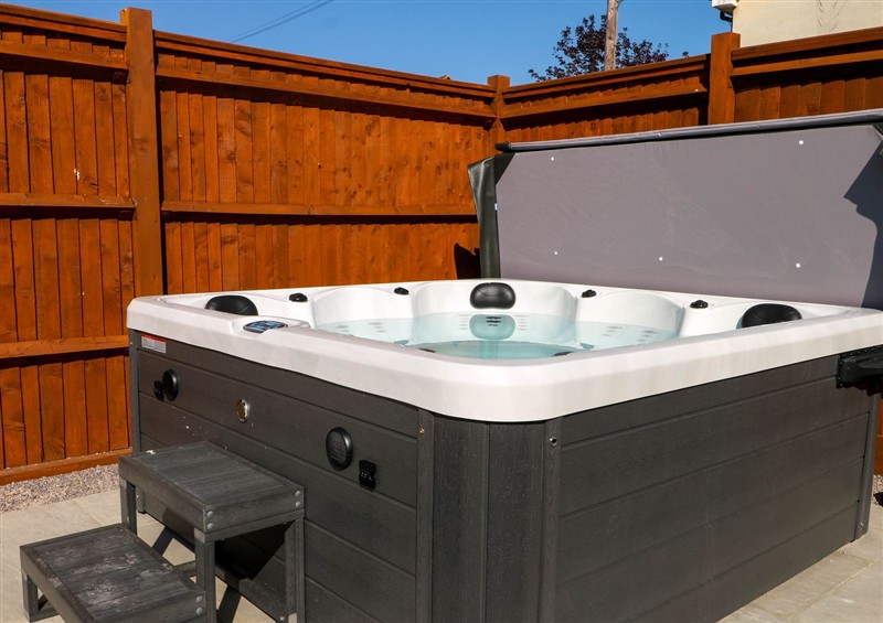Spend some time in the hot tub at Spring Cottage, Arundel