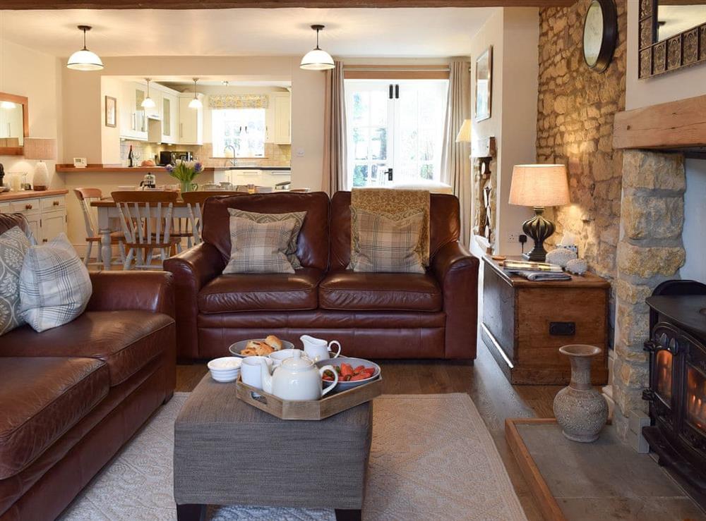 Comfortable open plan living space at Spring Cottage in Bourton-on-the-Water, Gloucestershire